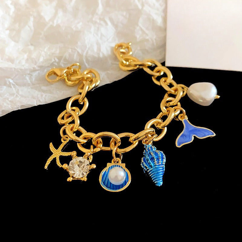 Stylish Gold Plated Pearl Tass - DippedShop Wholesale - #0243