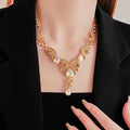 Vintage Gold Plated Rhinestone Hollow Droplet Pendant Necklace 6W6JNC941