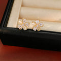 Elegant Gold Plated Cubic Zirconia Flower Stud Earrings 6W6JER725