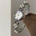 Elegant Pearl Gold Analog Quartz Bnagle Watch MK2SSAS6W6JWA01