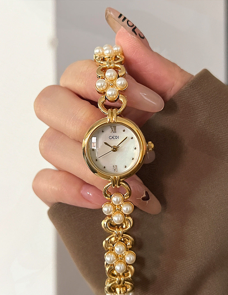 Elegant Pearl Gold Analog Quartz Bnagle Watch MK2SSAS6W6JWA01