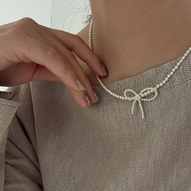 Elegant Zirconia Bow Knot Pearl Chain Necklace 6W6JNC431