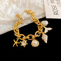 Stylish Gold Plated Pearl Tass - DippedShop Wholesale - #4707