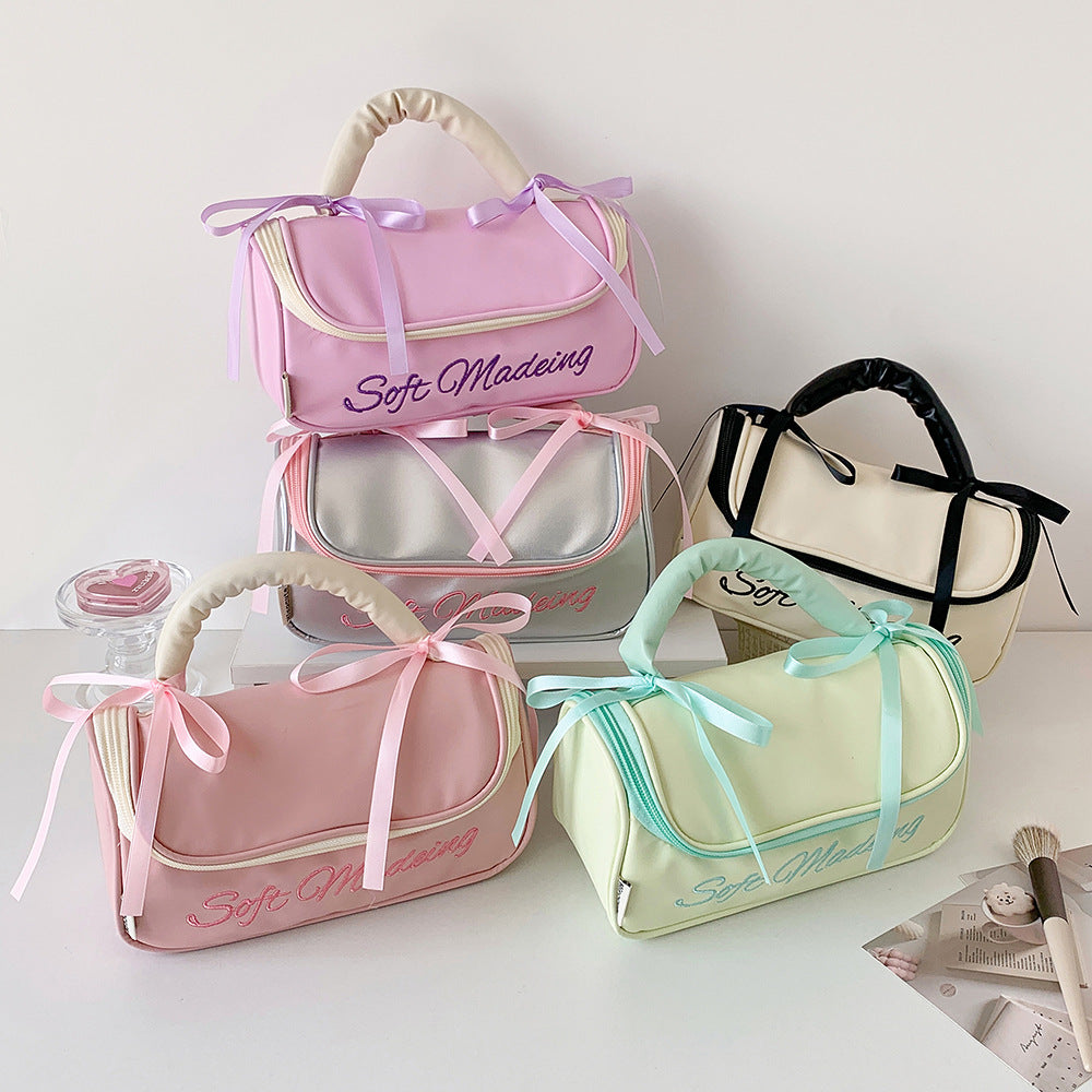 Cute Bow Knot Handheld Storage Bag DP25E954