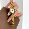Luxury Rhinestone Oval Dial Quartz Wrist Watch MK2SSAS6W6JWA02