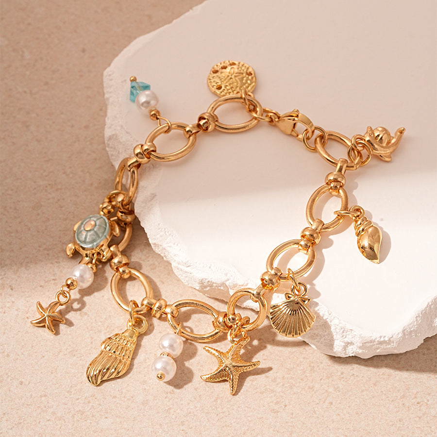 Stylish Gold Plated Pearl Tass - DippedShop Wholesale - #2563