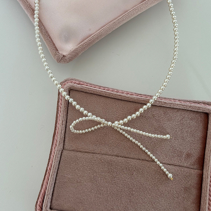Elegant Zirconia Bow Knot Pearl Chain Necklace 6W6JNC431