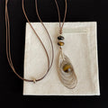 Stylish Hollow Feather Pendant Beaded Decor Necklace 6W6JNC681