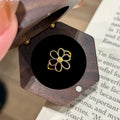 Stylish Hollow Out Daisy Floral Ring 8ZA6JRG133L