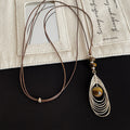 Stylish Hollow Feather Pendant Beaded Decor Necklace 6W6JNC681